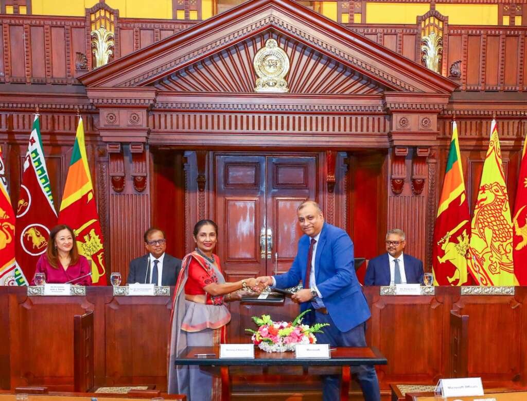 Ms. Wasantha Perera, Secretary of the Ministry of Education, and Harsha Randeny, Country Manager for Microsoft Sri Lanka and Maldives, at the MoU signing event for incorporating AI into Sri Lanka's national school curriculum.